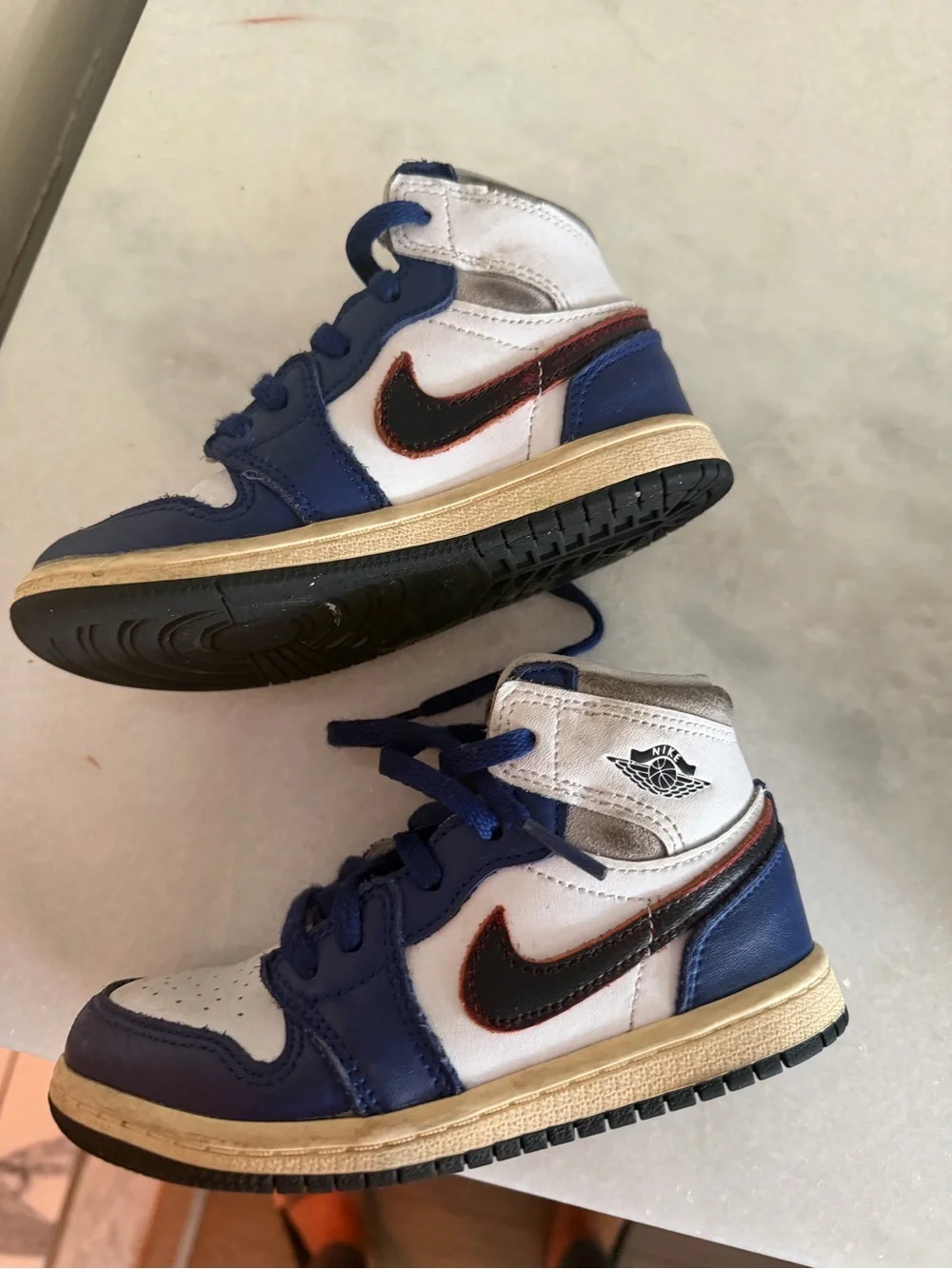 Nike Kids White and Blue High-Top Sneakers with Black Swoosh